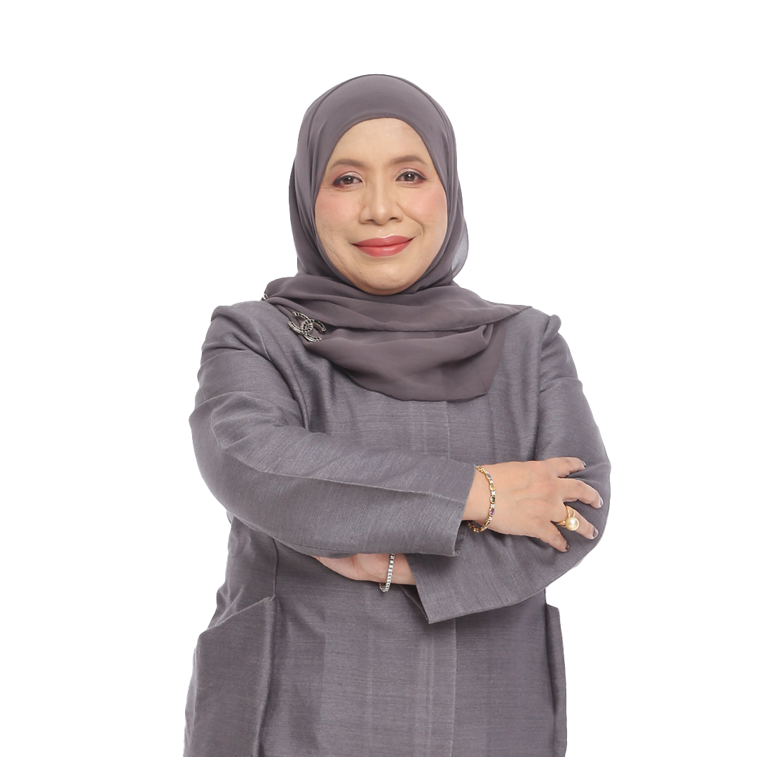 Munirah standing confidently with her arms crossed
