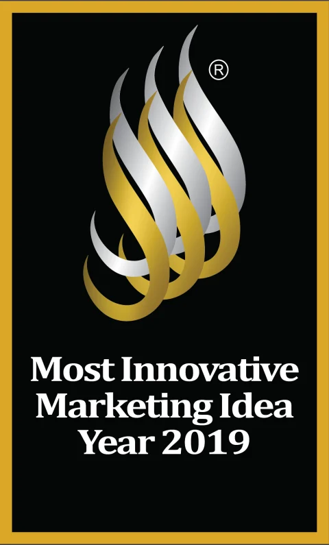 NREA Most Innovative Marketing Idea 2019 badge, gold flame on black